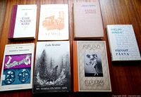 Seven Estonian books arranged in two rows