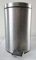 Front view of aluminum pedal trash can