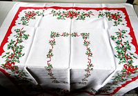 Full view of tablecloth showing border design and dimensions perspective