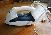 Side view showing full Sunbeam Classic iron with cord