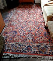 Full view of rug in room showing overall pattern and colors