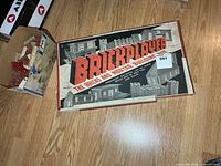 Exterior view of Brickplayer box alongside box of loose bricks