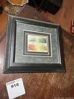 Full view of framed stamp set