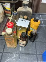 Group view of all bottles showing sizes, labels, caps and condition