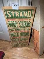 Front of cardboard poster with film listings