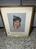 Full view of framed signed aboriginal portrait print