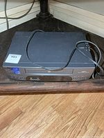 Front and top view of GE VCR with power cord