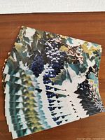 Stack of postcards showing grape image front