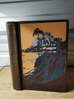 Front cover and spine of Volume VI showing illustration and embossed text