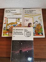 Front covers of the three books