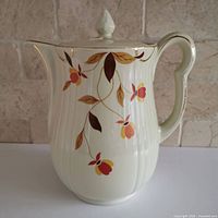 side view of coffee pot showing pattern and shape