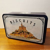 Top view showing BISCUITS text and Mont-Saint-Michel illustration