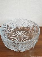 Top view of clear cut crystal bowl showing pinwheel cuts and starburst base