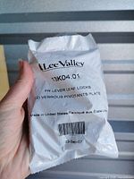 Front of sealed Lee Valley pouch showing model 13K04.01 and product name