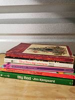 Stacked view of all five paperbacks