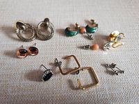 Full layout of all seven earring pairs