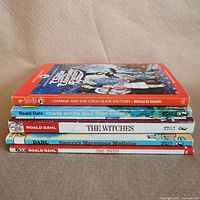 Stack of five Roald Dahl paperbacks side view showing spines and titles