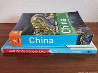 Spine view of both paperbacks stacked