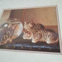 Front view of framed print showing kittens and fishbowl artwork