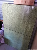 Green Formica table top with seam and leaf inserted