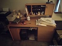 Full view of computer desk with hutch and contents for scale