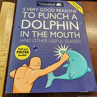 Front cover showing title, author, included poster notice, ruler for scale