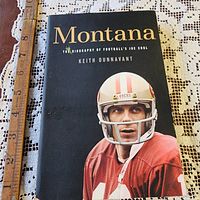 Front cover showing title, author, image of Joe Montana