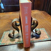 Spine of orange cloth hardcover Revolt in the Desert