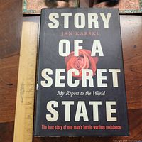 Front cover with title, author and ruler for scale