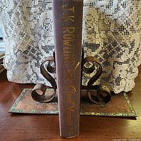 Spine showing gilt lettering and cloth texture