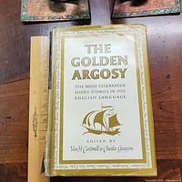 Front cover with dust jacket and ruler for scale