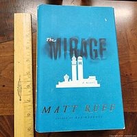 Front cover with dust jacket and ruler for scale