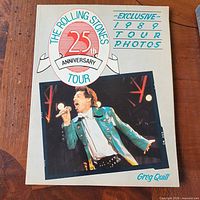 Front cover showing title, tour logo and Mick Jagger performance photo