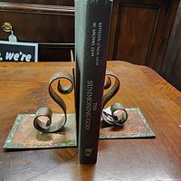 Spine view showing title, authors, publisher logo