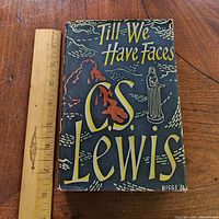 Front of dust jacket with ruler indicating size