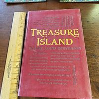 Front cover with ruler indicating approx 8 in height