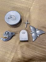 Group shot showing all five pewter items