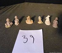All six Wade Whimsies figurines lined up