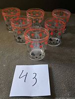 Six matching card suit tumblers front view