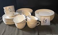 Assorted Mikasa Homestead stoneware cups, saucers, side plates and bowls