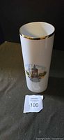 Front of white souvenir vase with Mannheim Water Tower graphic and gold rim