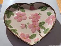 Top view of heart-shaped Franciscan Desert Rose dish