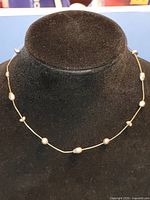 Necklace on display bust showing bead pattern