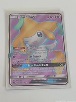 Front of sleeved Jirachi-GX card