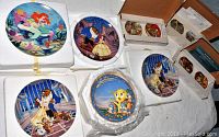 A group photo of 7 Bradford Exchange Disney collectible plates and 2 sets of boxed plates, displayed in original packaging with Certificates of Authenticity included.