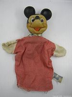 Full view of Mickey Mouse hand puppet showing head and cloth body