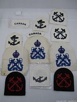 Full set of 12 badges laid out