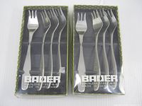 Two boxed sets of four Bauer stainless steel forks