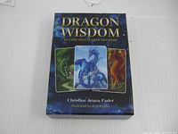 Front of Dragon Wisdom boxed set showing title, author, illustrator and dragon artwork