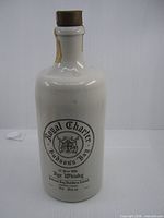 Full bottle front view showing branding and shape